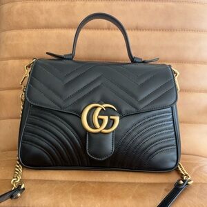 Black Gucci Marmont Handbag with Gold Accents